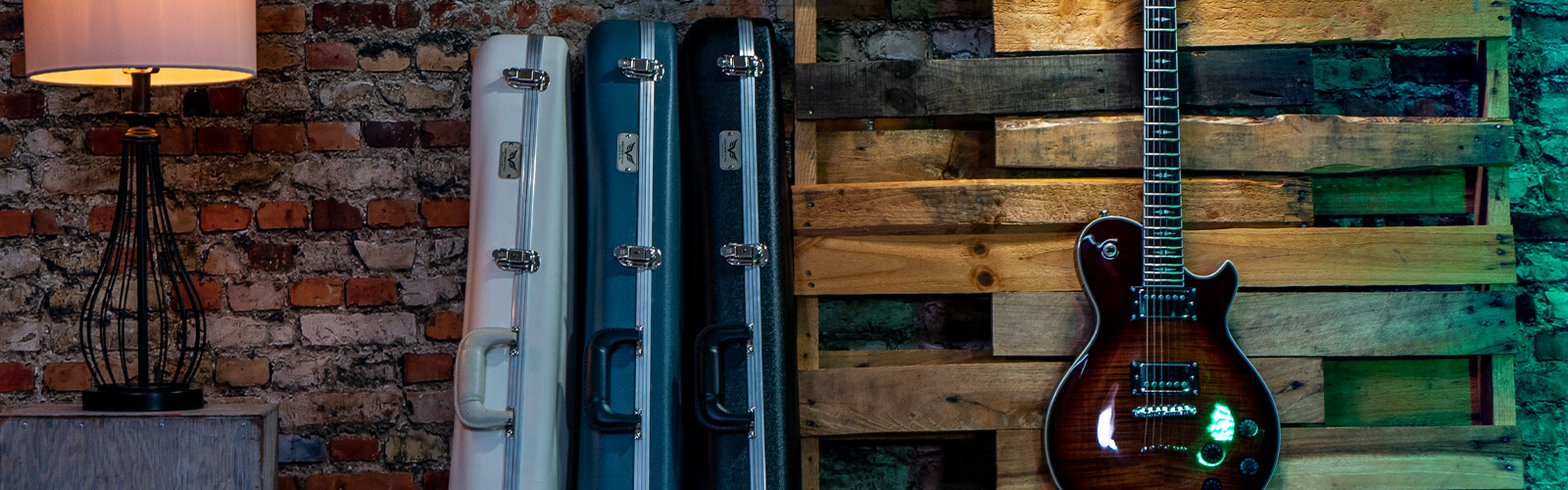 TKL Vectra cases against a brick wall