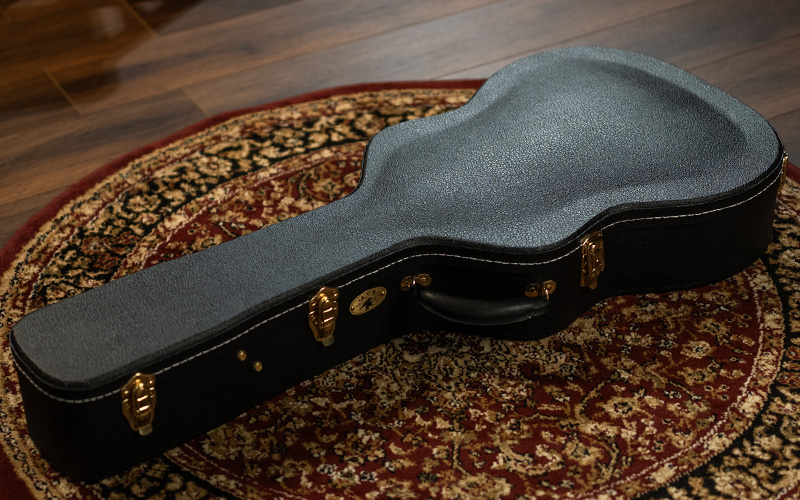 TKL-AVS-American-Vintage-Series-OM-Complete Case on rug